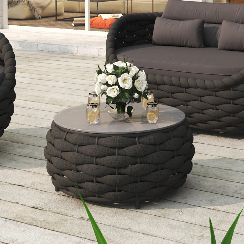 Jio Round 14.2'' Outdoor Coffee Table with marble pattern tile tabletop | Wayfair North America