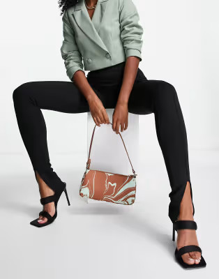 NA-KD x Viktoria & Charline slit front leggings in black | ASOS (Global)