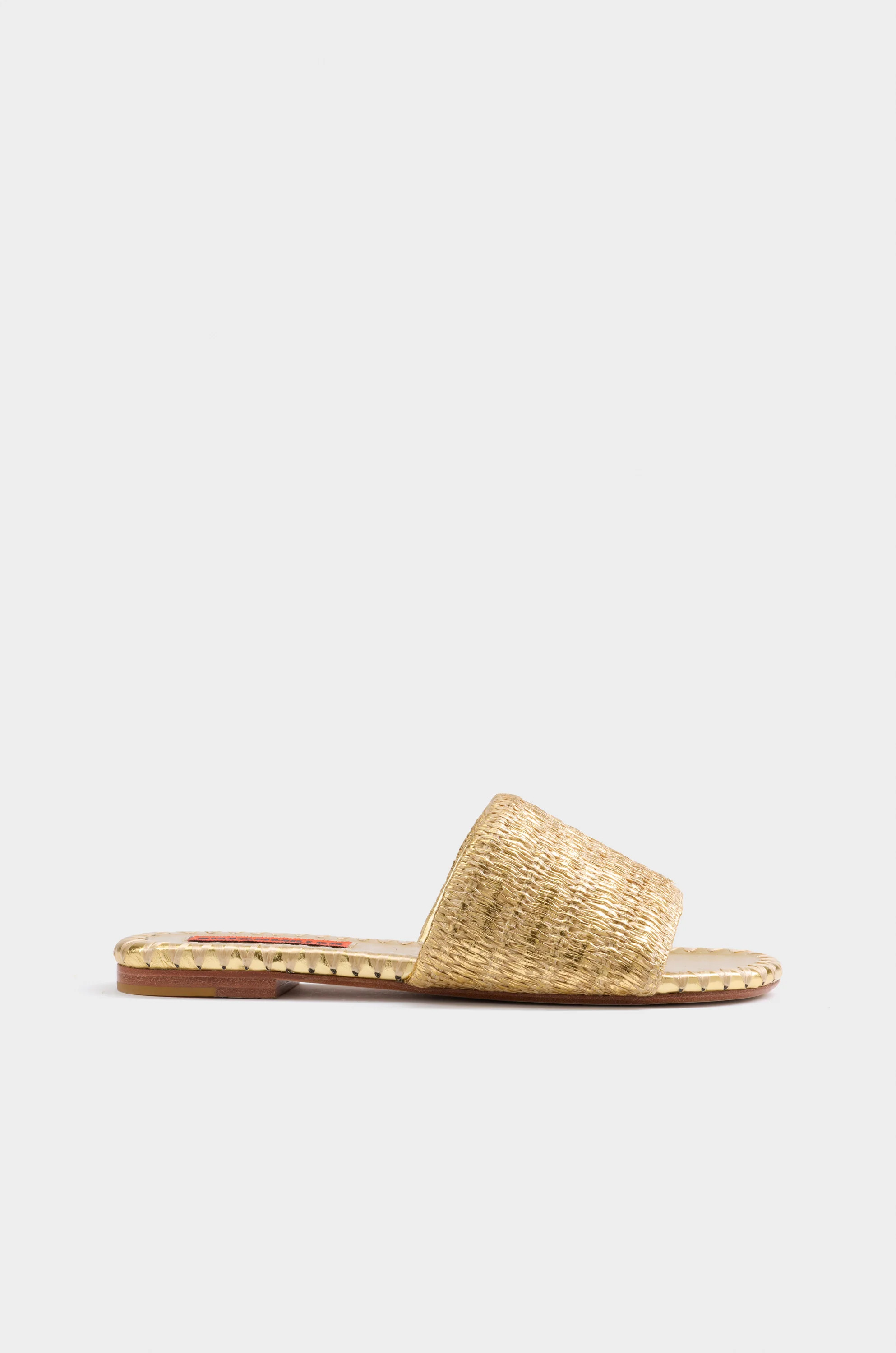 Metallic
           Raffia Salerno Slide in Gold/Natural | Simon Miller