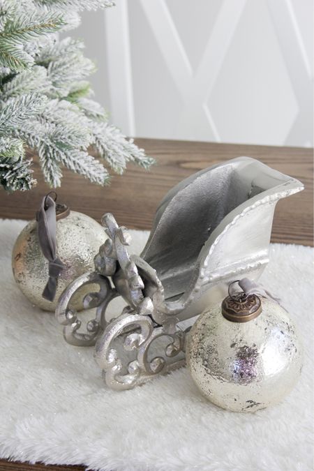 Christmas tabletop decor christmas sleigh Mercury glass ornaments 

#LTKGiftGuide #LTKHoliday #LTKhome