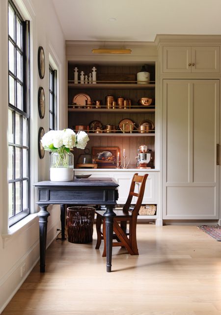 Moody Modern Traditional Kitchen 🖤

Copper cookware, copper bowls, copper canisters, kitchenaid mixer, step stool chair, traditional desk, candlesticks

#LTKSeasonal #LTKhome