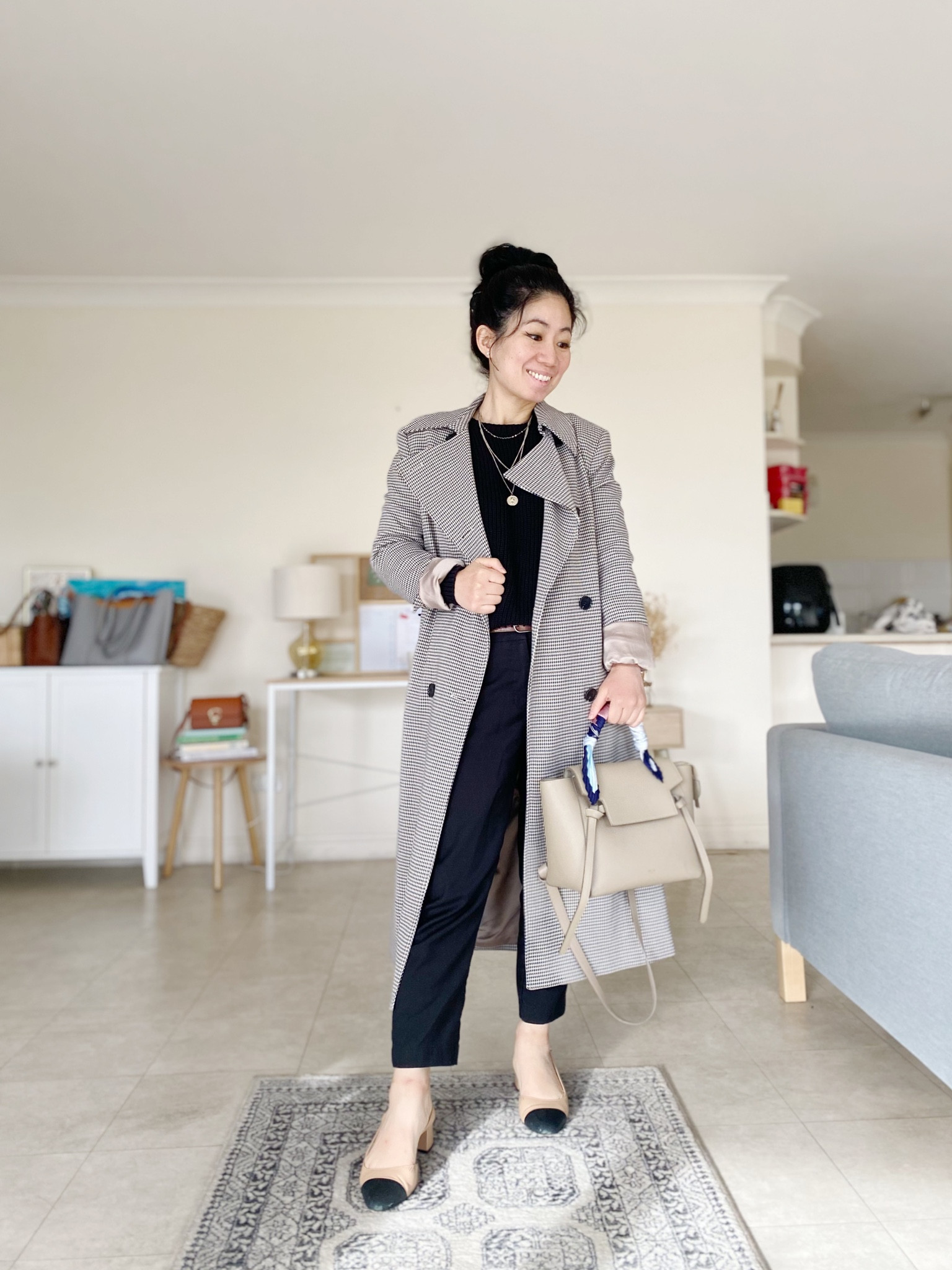 Another work day, another workwear outfit. When feeling uninspired I find myself reaching for an all black monochrome and add interest with a statement coat and shoes. . 

Coat is new to my closet this Winter. A longish midi length. Wearing usual size in AU 6. Soft trench and light to medium weight. Not quite warm enough for very cold days but perfect for Autumn (and probably spring) and our mild Sydney winter. 

Black sweater is 100% cotton which is super rare find these days with the market dominated by synthetics. It’s a chunky knit and hem ends below my hips. May not suit everyone if not wanting an oversized fit. Wearing XS. 

Pants are old from Forcast. Look for descriptions like “cropped” length and will be perfect for petites. 

Shoes leather upper and leather lining. AU 6, needs a bit of breaking in to soften the leather. 

#LTKworkwear #LTKstyletip #LTKaustralia