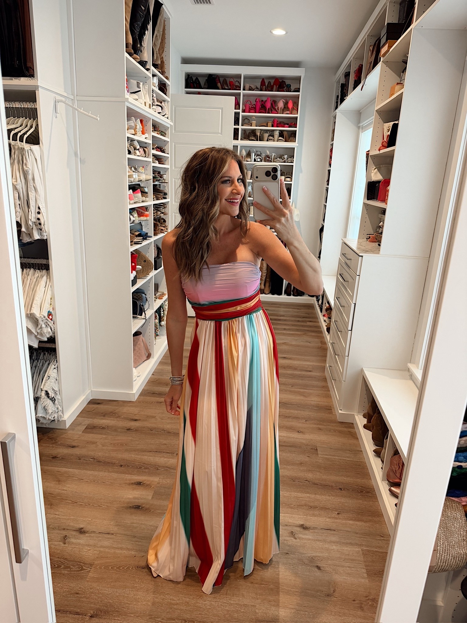 In a medium colorful strapless maxi dress, heels and accessories- fits tts. 

#LTKSeasonal #LTKWedding #LTKootd