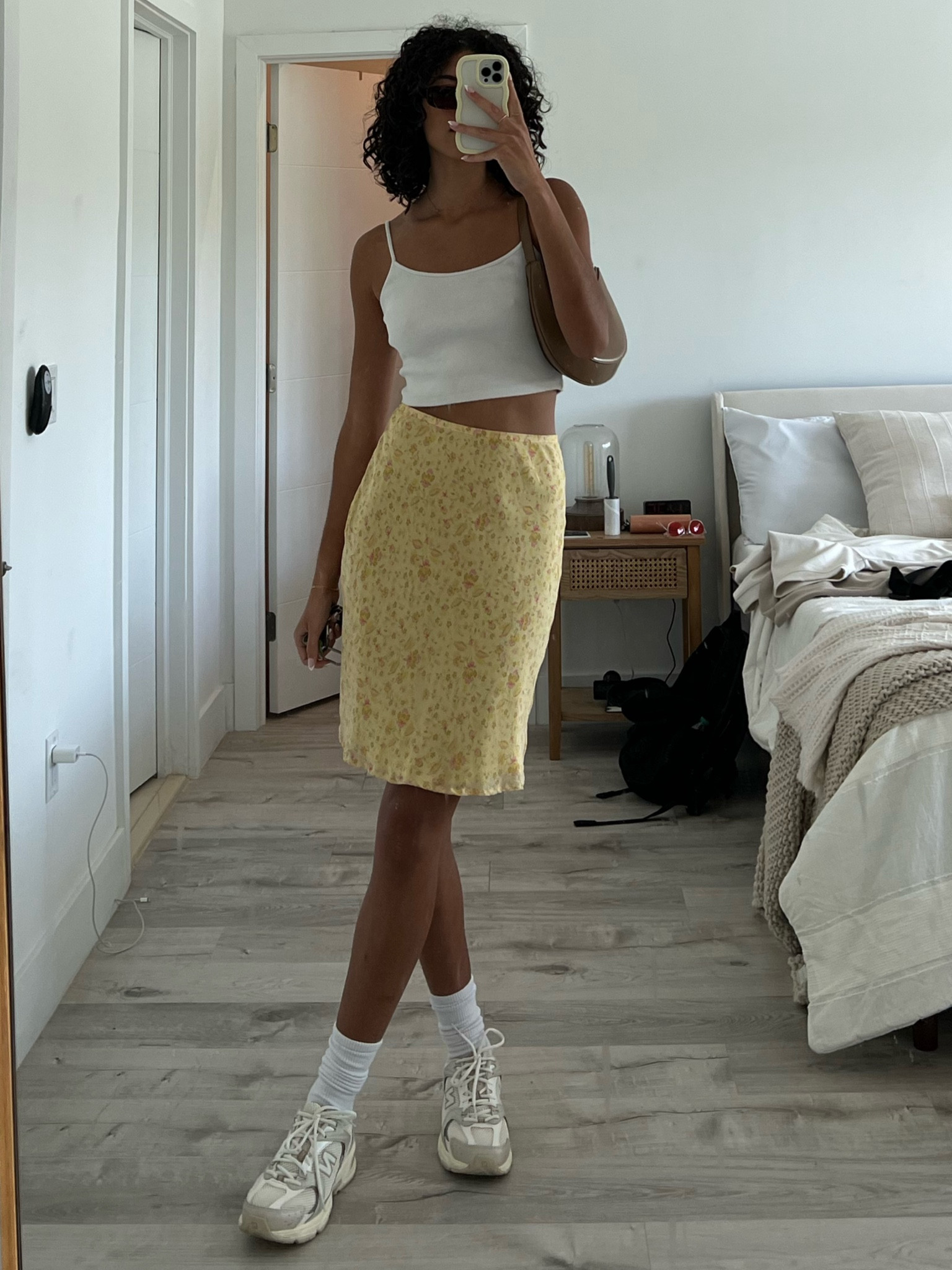 miami outfit 🌞 

skirt: thrifted (Ann Taylor)
white cami crop top: princess Polly 
brown shoulder bag: mango 
white crew socks: Los Angeles apparel 
Beige/neutral sneakers: new balance 
