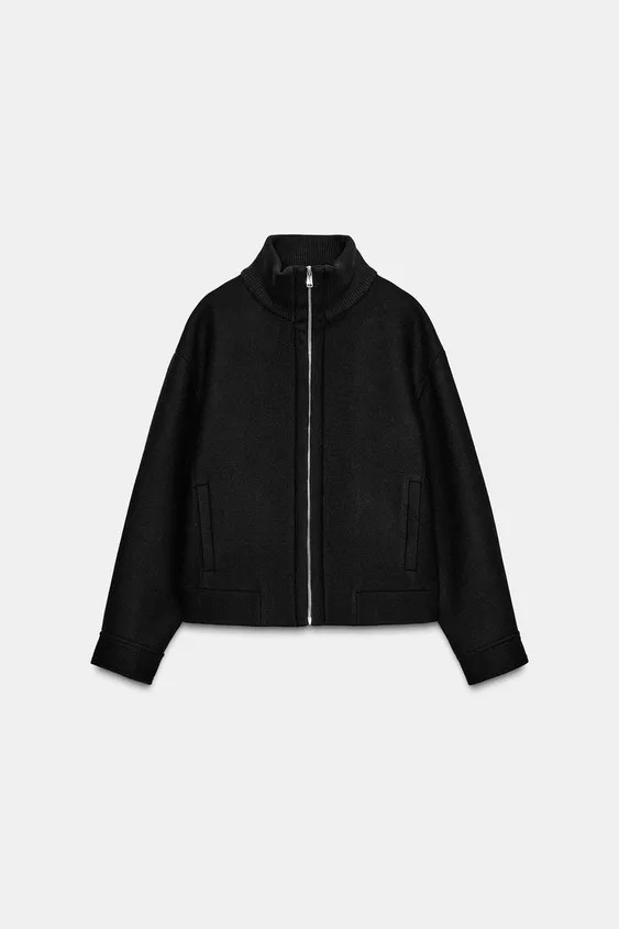 Coat made from wool. High neck and long sleeves. Front welt pockets. Front zipper closure. | Zara US