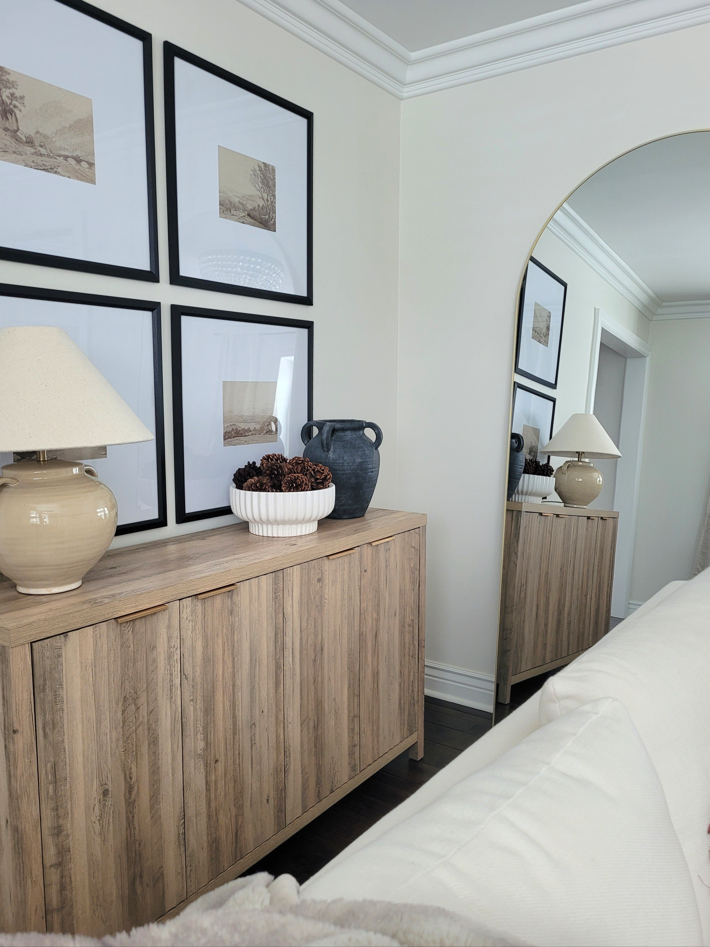 Living room inspo - cabinet storage,  floor mirror,  gallery wall, decorative bowl,  console styling, landscape art, fluted cabinet,  Amazon home

#LTKHome #LTKSaleAlert