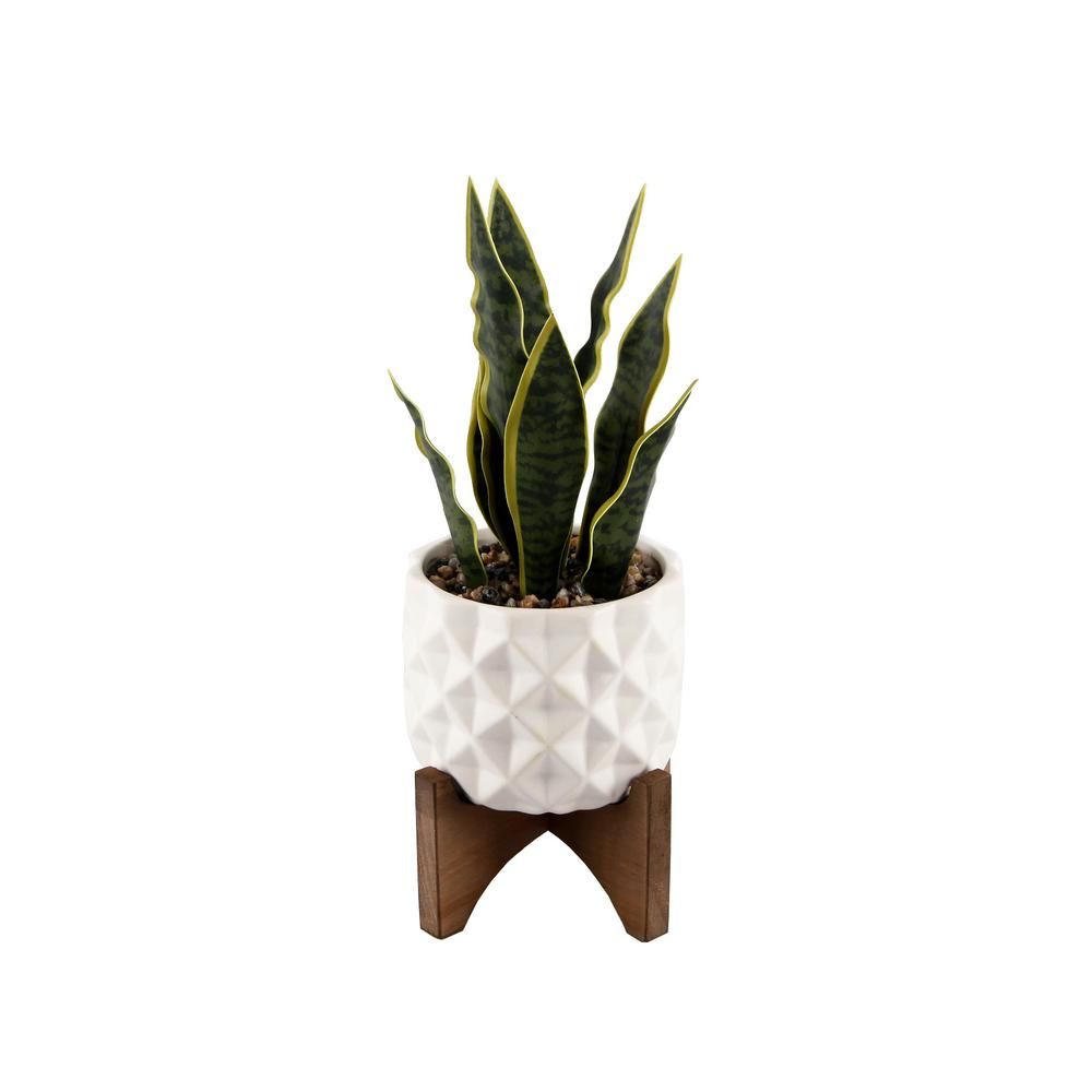 Flora Bunda 12.5 in. Faux Snake Plant in White Dimple Pattern Ceramic Pot on Wood Stand | The Home Depot