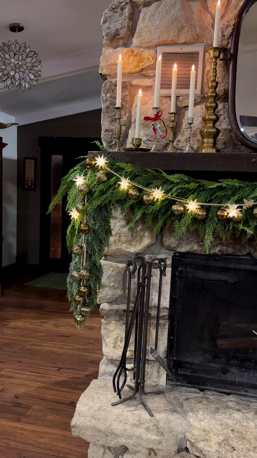 I am so excited with how my mantle is shaping up I had to share. The layers of garland, the gold bulbs and the warm light from the Moravian stars that pulls it all together. It’s starting to look a lot like Christmas  