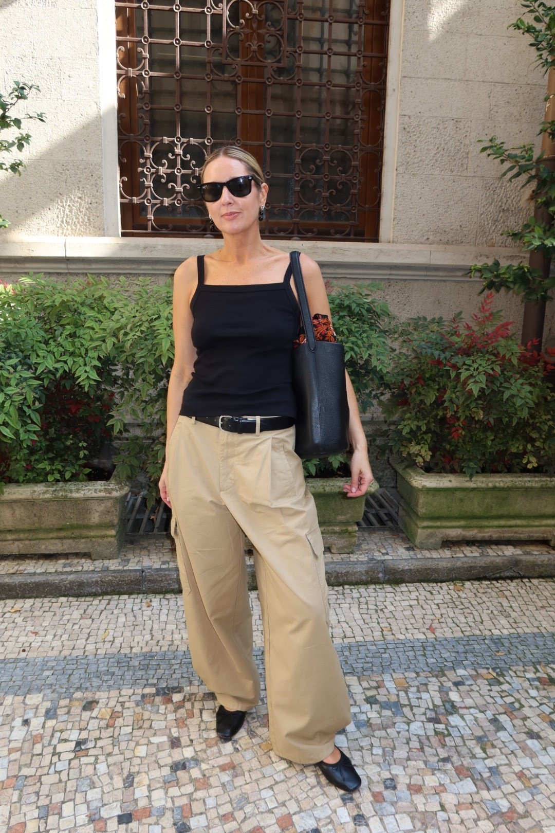 OOTD

black square neck tank, black leather belt, khaki cargo trousers, wide leg tailored trousers, black leather flats, black leather tote bag, black square sunglasses, street style, European street style, casual chic outfit, off duty style, elevated basics, quiet luxury, neutral color palette, monochrome styling, ltkstyletip, ltkseasonal, ltkfindsunder100, ltkitbag

#LTKFashionMonth #LTKdatenight #LTKeurope