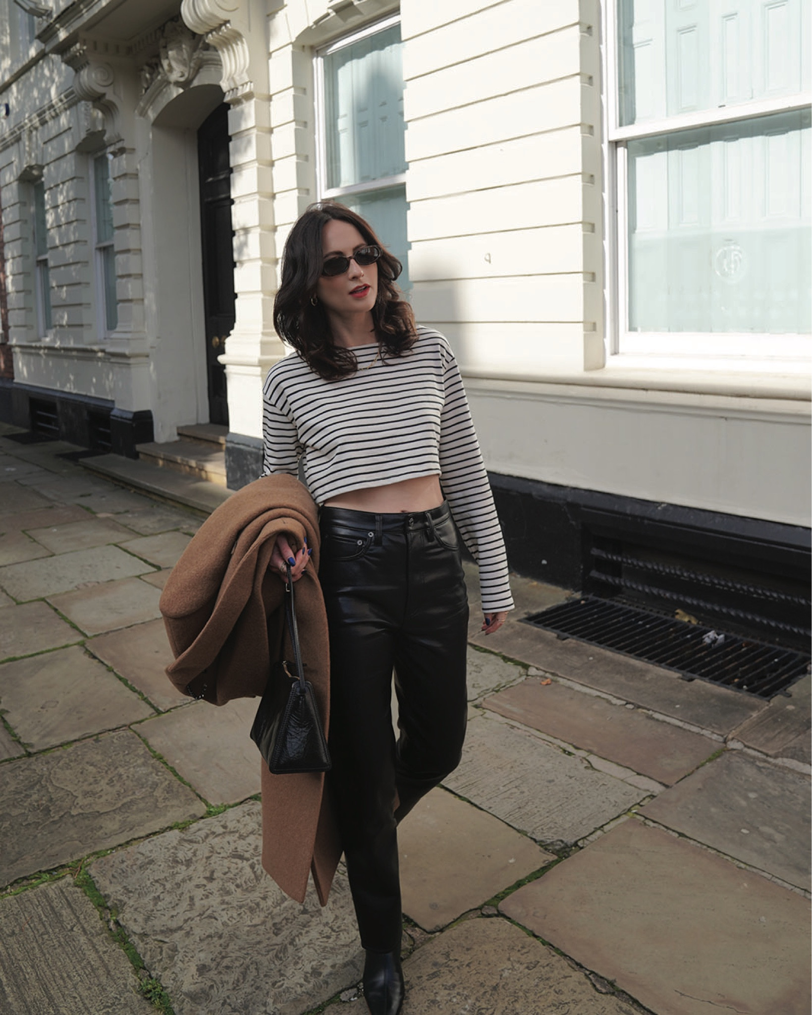 camel wool blend coat, striped top, leather pants, sunglasses, black bag, gold hoops, chain necklace, gold jewellery, heeled boots, whistles, frankie shop, le specs, net a porter, selfridges, by far, coggles, astrid & miyu, monica vinader, daisy jewellery, manu atelier, luisaviaroma, agolde, abercrombie and fitch, h&m, arket 

Black Friday/Cyber Week discounts:
wool blend coat: whistles 20% off 
wool blend coat: abercrombie & fitch 25% off
by far black boots: (via coggles) 25% off
gold hoops: astrid & miyu 25% off
gold bracelet: monica vinader 30% off 
chain necklace: daisy jewellery 20% off 

#LTKeurope #LTKstyletip #LTKCyberSaleUK