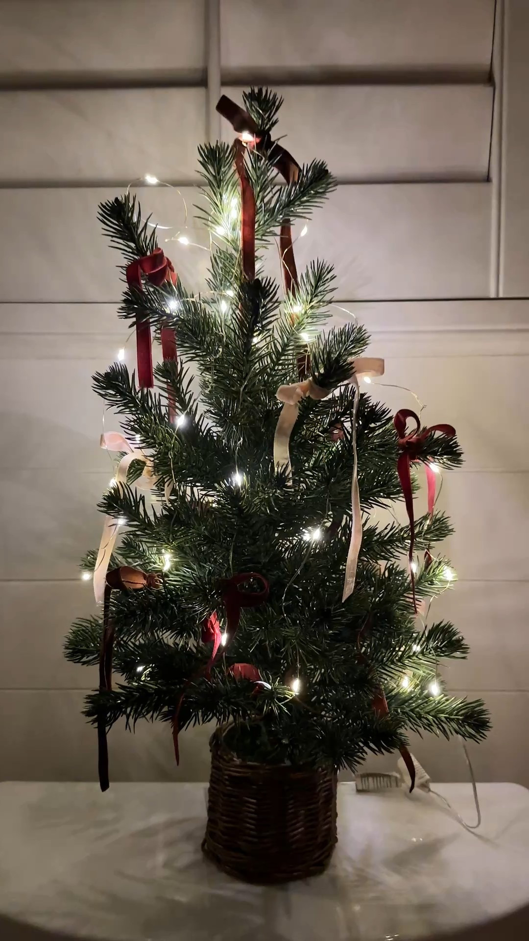 Mini Christmas tree with velvet bows and fairy lights 

#LTKHoliday #LTKHome