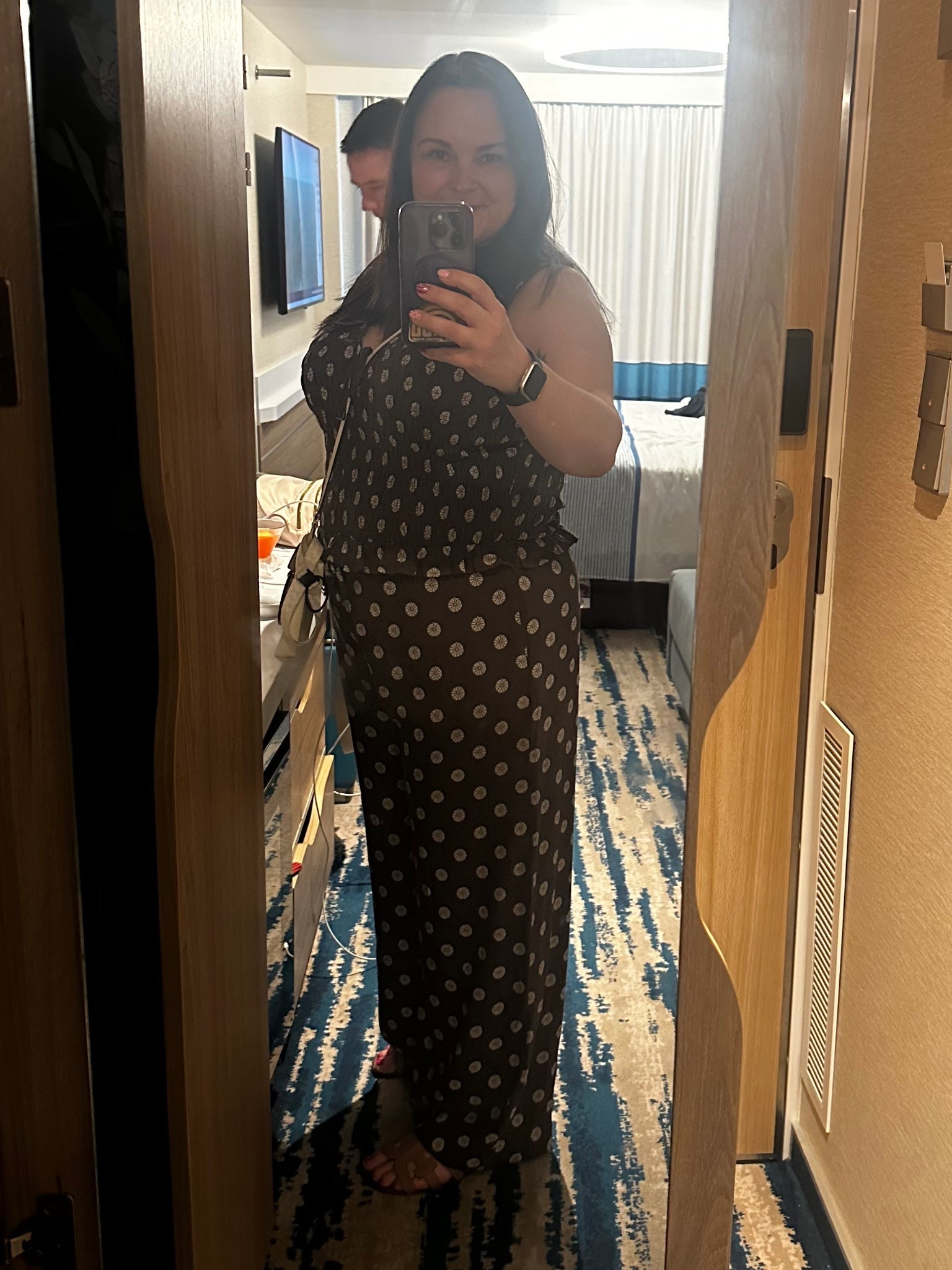 Casual midsize ootd with a polka dot top (linked) and matching flowy pants. This lightweight, breathable outfit is perfect for hot weather, travel days, or vacation outfits. The relaxed fit makes it comfortable for all-day wear while still looking put together. Top is true to size. A go-to summer outfit formula for midsize women.

#LTKTravel #LTKootd #LTKMidsize