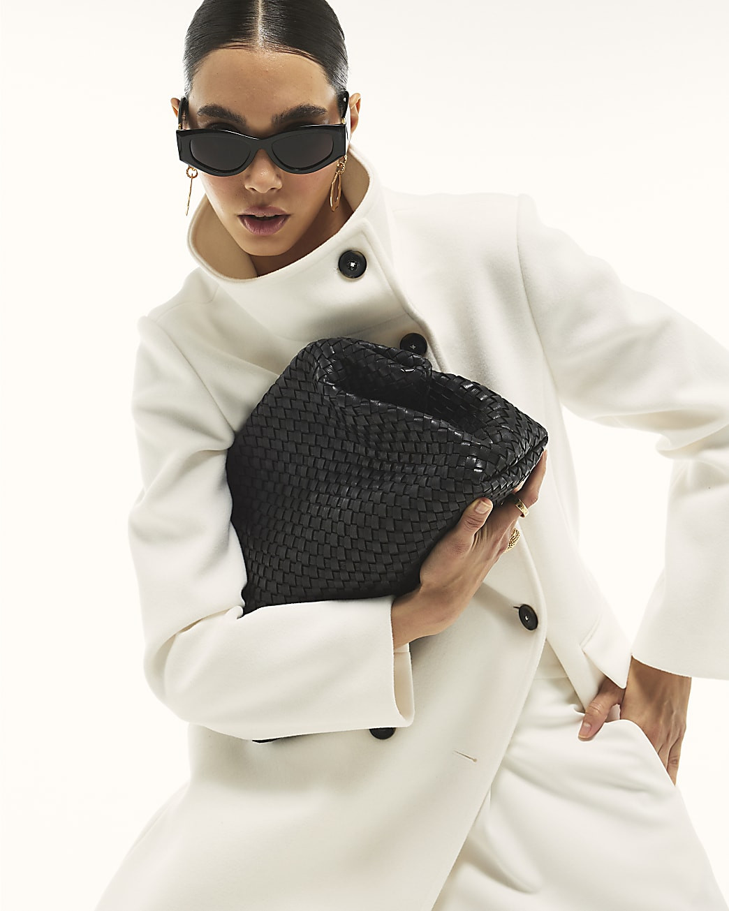 Black Premium Woven Leather Clutch Bag | River Island UK & IE