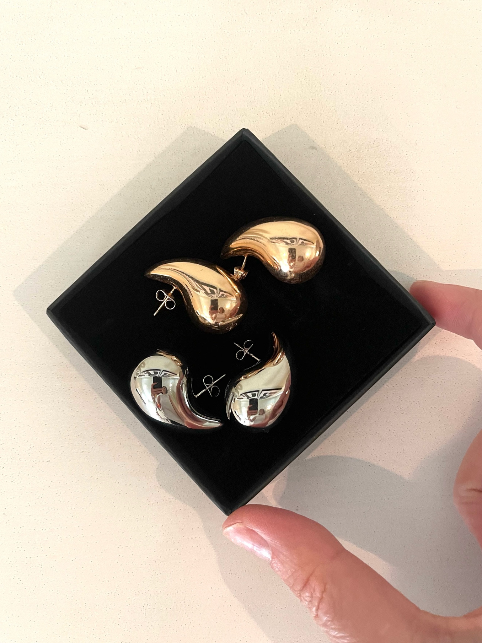 Love these teardrop earrings so much I bought them in gold first and was so happy I got the silver too. And such a good price #lookforless #bottegadupe #amazonjewelry 

#LTKover40 #LTKSeasonal #LTKstyletip