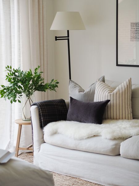 The lamp you all love is now back in stock. Shop this whole modern traditional monochrome living room look below. 

#LTKeurope #LTKhome #LTKFind