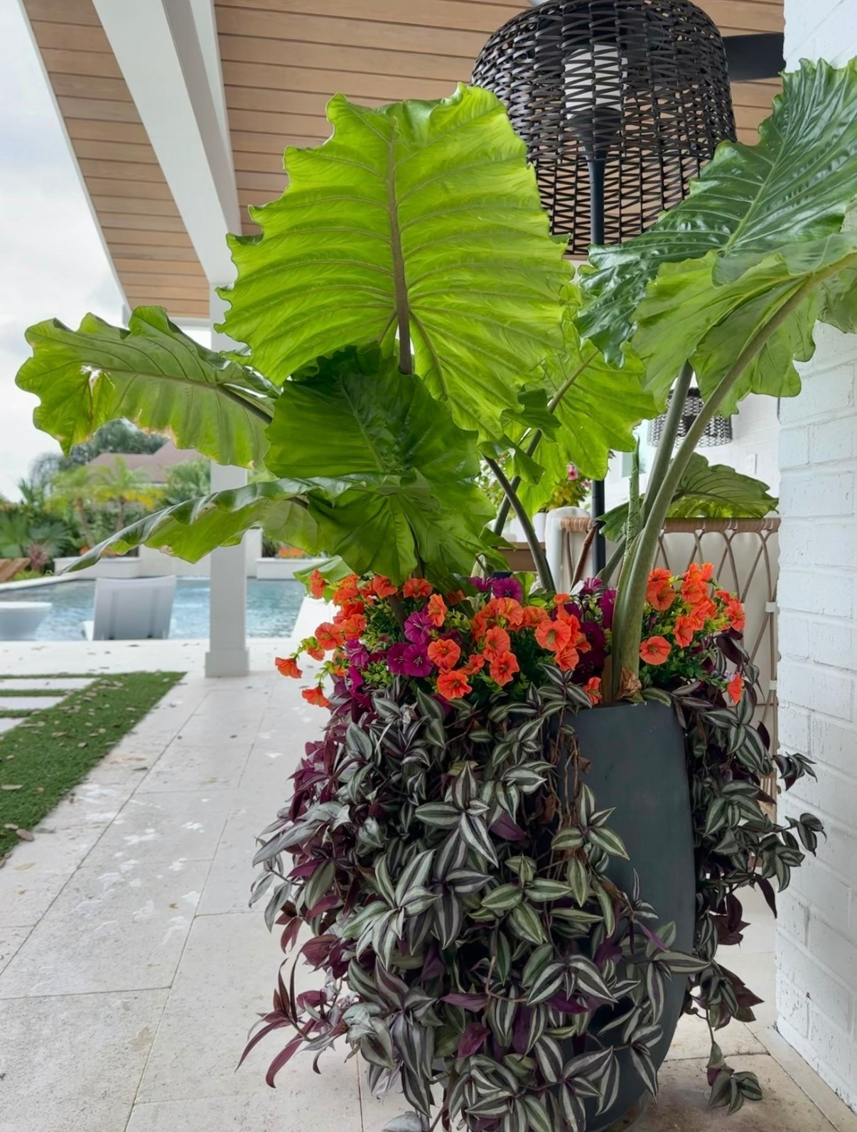 Planter and faux outdoor flowers that look REAL! 
Outdoor living backyard decor 