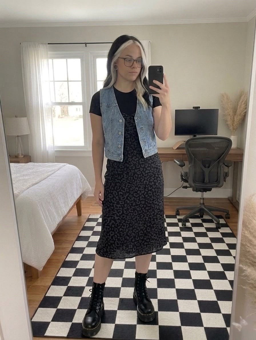 Layering a classic denim vest over a dark leopard print slip dress is my favorite way to transition into warmer weather! This casual midi dress outfit is perfectly balanced with chunky black combat boots for a touch of 90s grunge style. It’s the ultimate comfortable yet put-together look for a casual date night, weekend brunch, or everyday street style.

#LTKootd #LTKMidsize #LTKSeasonal