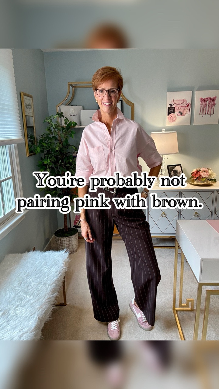Pink and brown might be one of my favorite fall color combinations — and I don’t think we wear it nearly enough.

Want the links? Like, Follow & Comment and I’ll send links right to your DM.

I paired a light pink short-sleeve button-down with brown pinstripe trousers, then repeated the pink with suede sneakers. The brown makes the pink feel more fall, while the sneakers keep the trousers casual enough for everyday wear.

This is exactly what I mean by timeless, classic everyday style: wearable pieces, an unexpected color combination and an outfit you can actually recreate.

Save this fall outfit idea to try later, and send it to the friend who always reaches for black instead of brown.

Would you wear pink + brown together?

#TallStyle #FallOutfitIdeas #StyleOver50 #TallWomenStyle

#LTKootd #LTKOver40 #LTKTall
