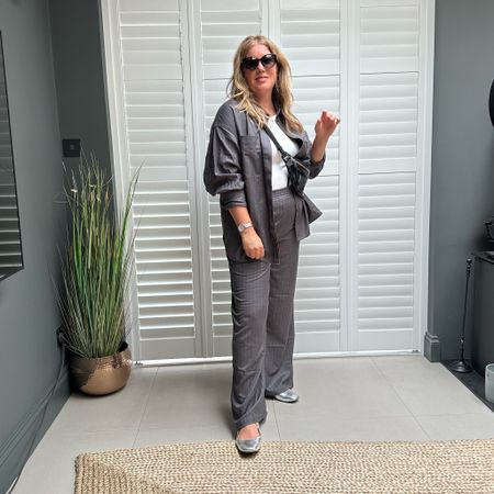 Pin stripe wide leg trousers and oversized shirt, silver shoes. Mary janes 

#LTKeurope #LTKstyletip #LTKshoecrush