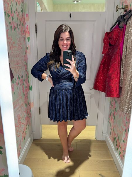 Another super cute party dress that I am so happy joined the sale! The dress is navy blue and has the best hint of shimmer to it! The dress runs TTS, comes in one other color option and is on sale for $129 (originally $258)!

#LTKstyletip #LTKmidsize #LTKsalealert