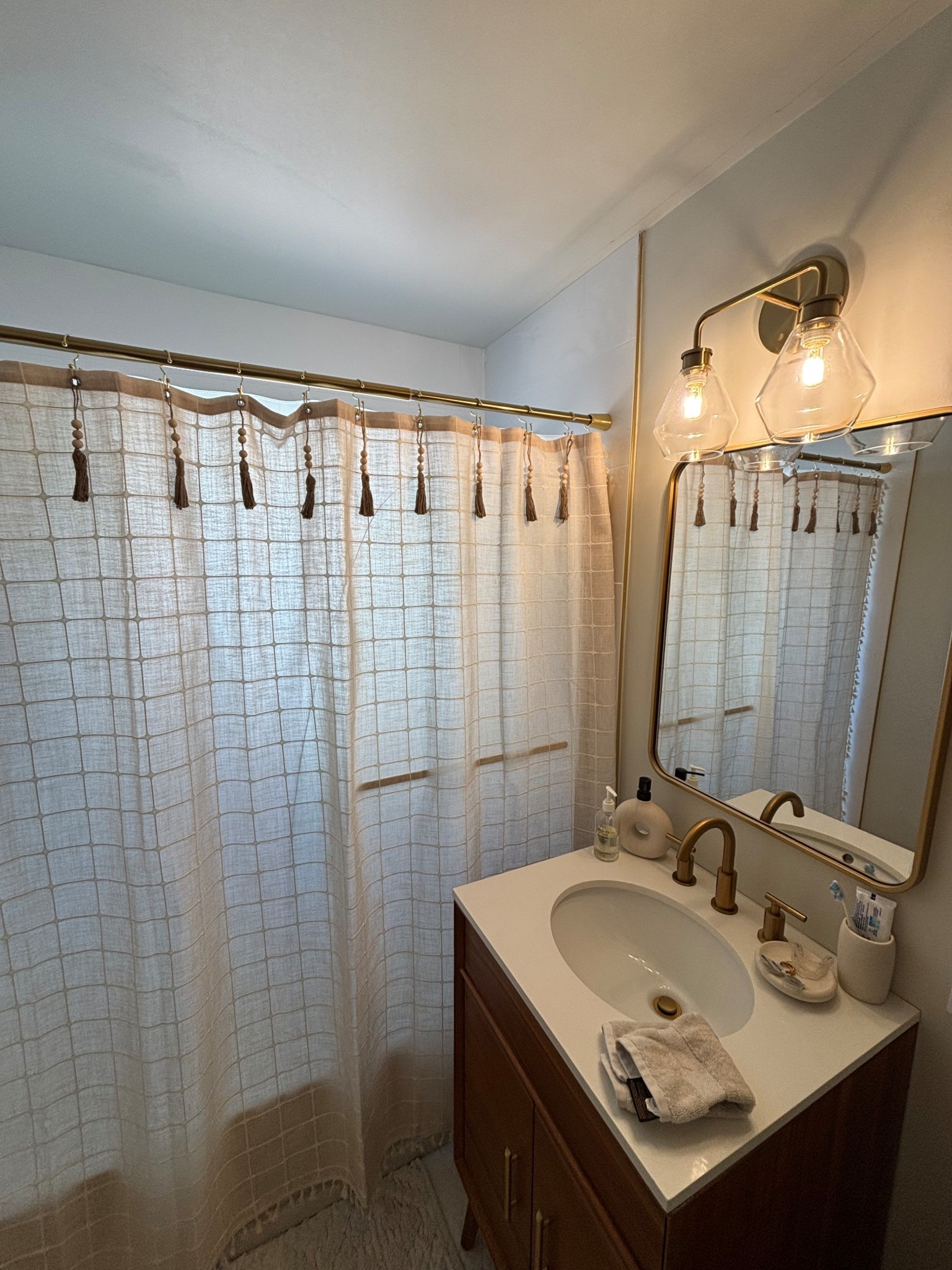 The shower curtain and small tassels that made my bathroom feel cozy and homey! 

#LTKFindsUnder50 #LTKStyleTip #LTKHome