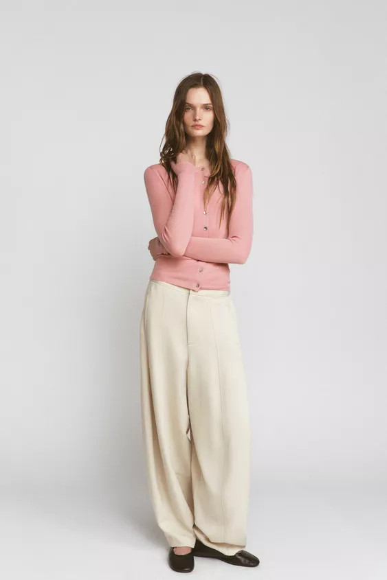 Cardigan with main fabric made of 100% wool yarn. Round neck and long sleeves. Front button closu... | Zara US