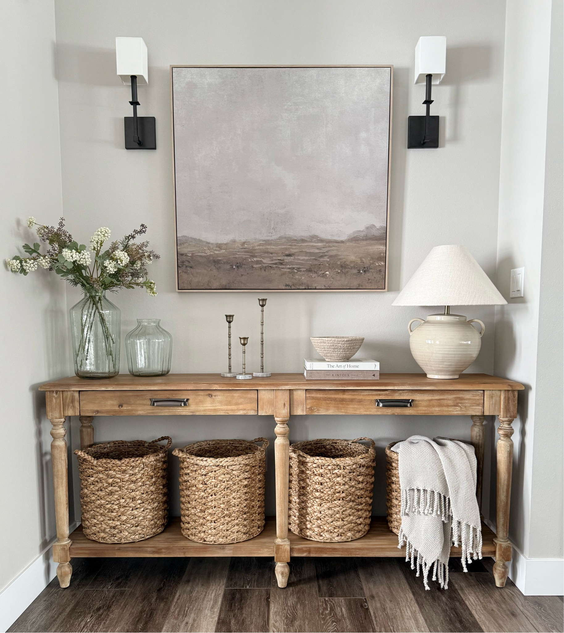 This console table styling is perfect for winter or spring. 

Console table / foyer / studio McGee / threshold / hearth and hand / wall art / stems / florals / candle holders / candle sticks / glass vase / ceramic decor / natural baskets / throw blankets / wall sconce / neutral decor / transitional / modern organic / farmhouse / winter / spring / foyer entry 

#LTKFindsUnder50 #LTKHome #LTKFindsUnder100