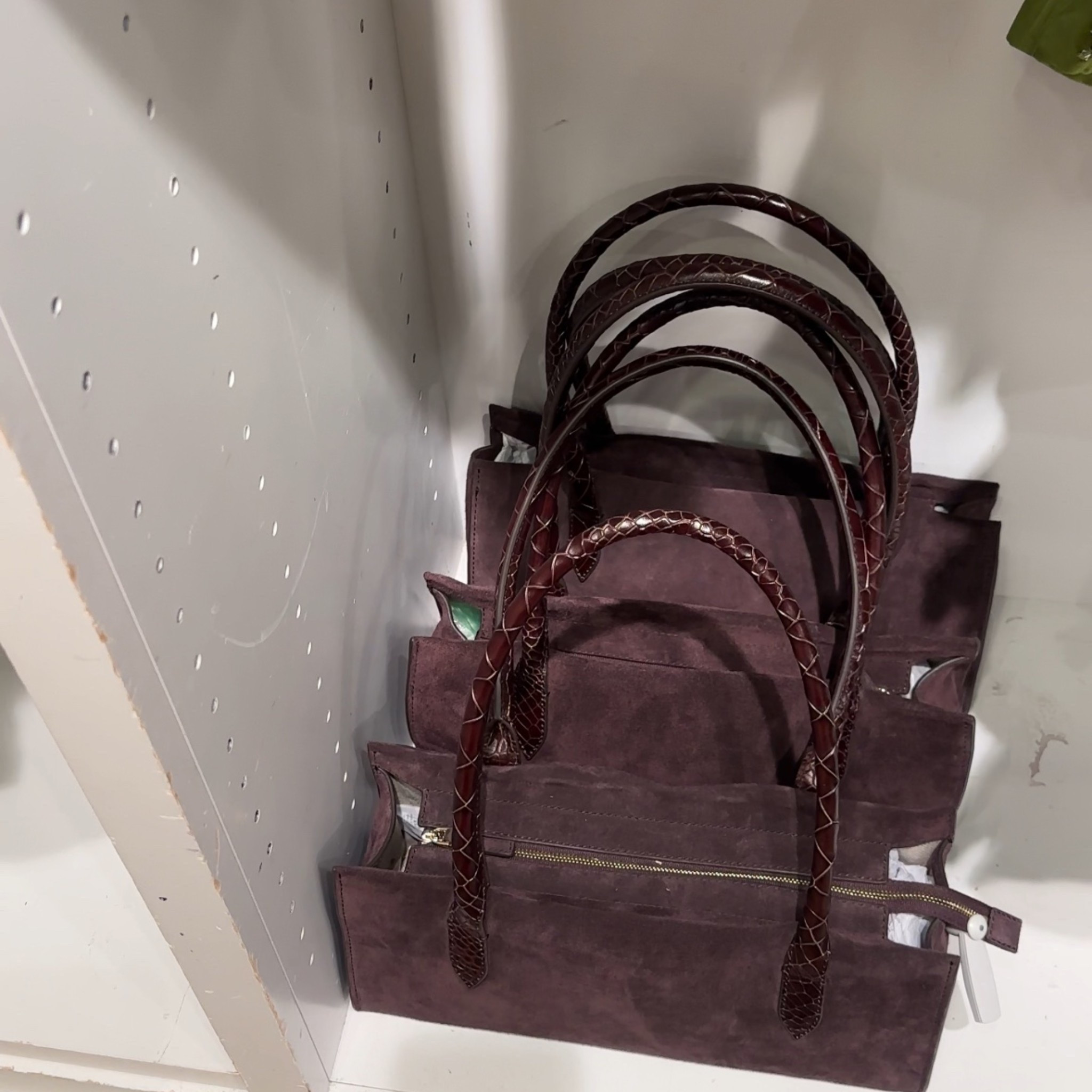 This chocolate brown J Crew suede bag is on sale. It’s very cute, minimalistic, and that beautiful brown color! 