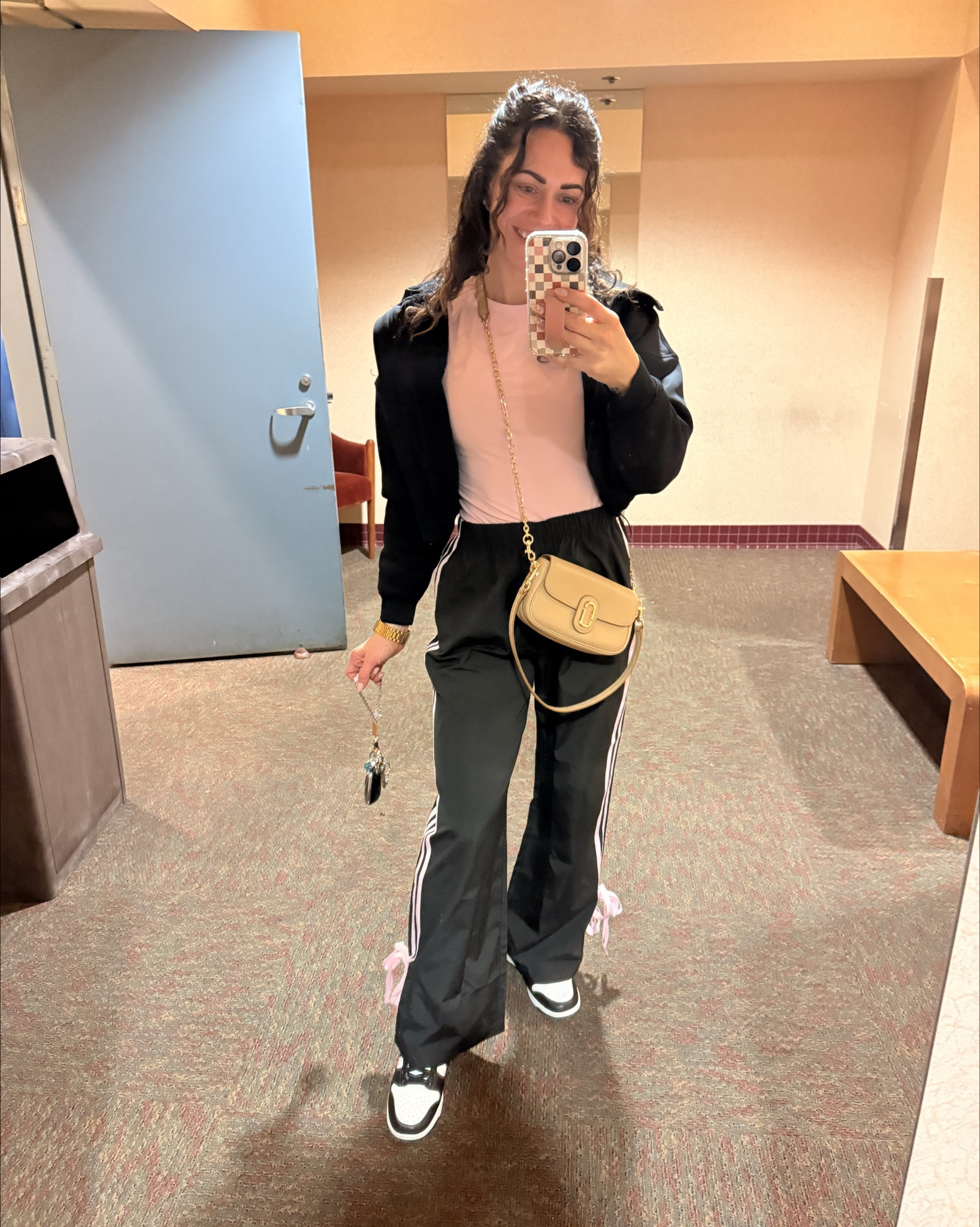 Dance mom outfit of the day! I couldn’t find the exact colorways I’m wearing, but I linked the exact tee and pants in different colors. Also, my Marc Jacob’s bag is 50% off right now! 💞🖤

#LTKSpringSale #LTKmomlife #LTKgrwm