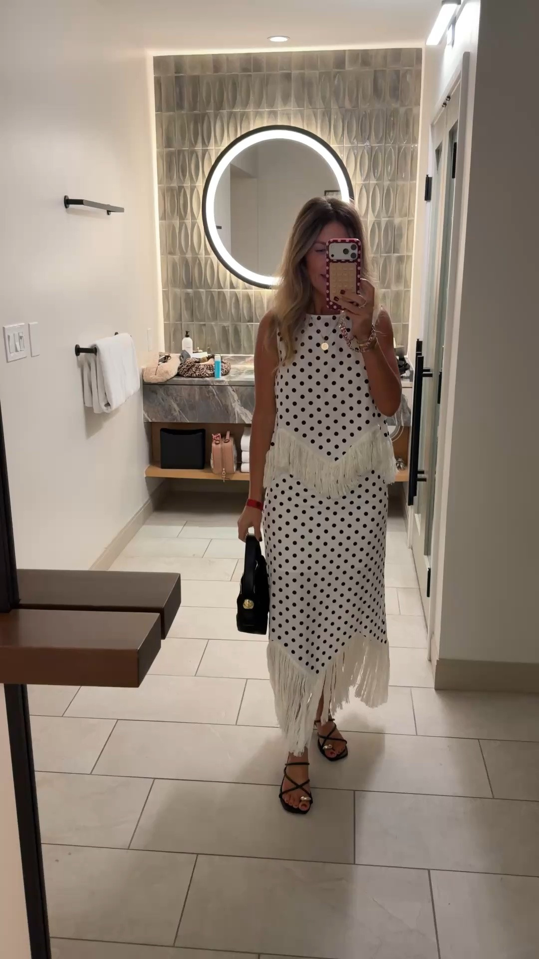 Last night’s outfit! 
Amazon Polka dot fringe skirt set size small 
Amazon bag 
Velvet caviar phone case + accessories 
Amazon heels run tts

#LTKOver40 #LTKPetite #LTKootd