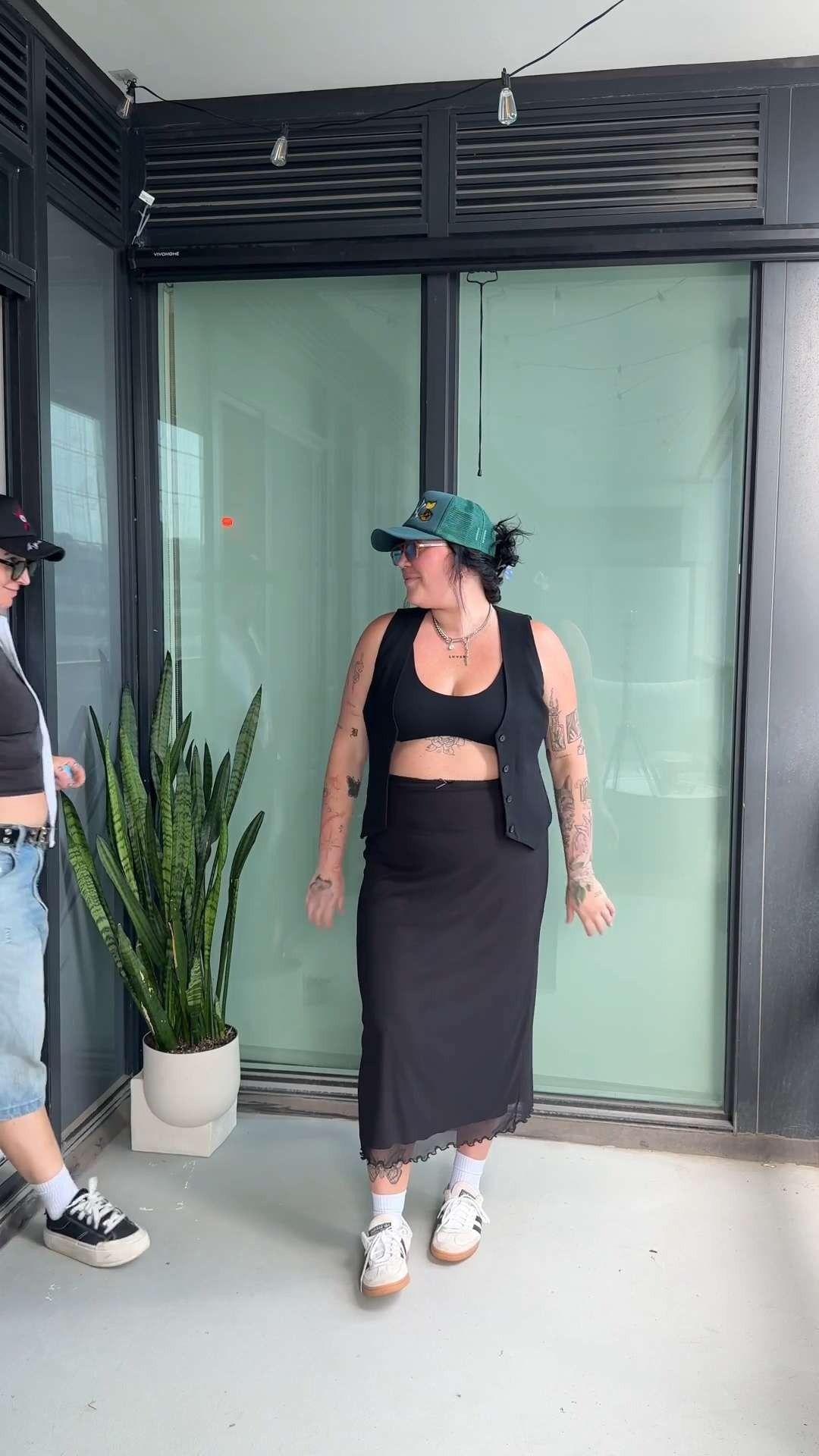 Tomboy femme summer night vibes 🔥 Long black skirt, classic adidas spezial, a vest moment, and just the right accessories—color lens sunnies + an embroidered hat I’m obsessed with. Cool, comfy, and perfect for golden hour hangs with my girl. Linked everything for you 🖤

#TomboyFemme #LTKStyle #LesbianStyle #CoolGirlOutfit #SummerNightLook #MidSizeFashion #QueerStyle #RedPumas #LesbianCoupleContent #LTKOutfitIdeas 

 