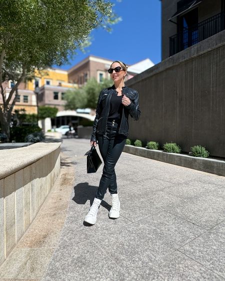 I got asked recently how to style skinny jeans with high top sneakers so I shared lots of ideas on glamourandgains.com. One converse high top wedges outfit idea (it’d look better with black shoes) is black skinny jeans, a black t-shirt and black moto jacket for a flattering look you can create with items you probably already have in your closet. 

#LTKFindsUnder100 #LTKShoeCrush #LTKStyleTip