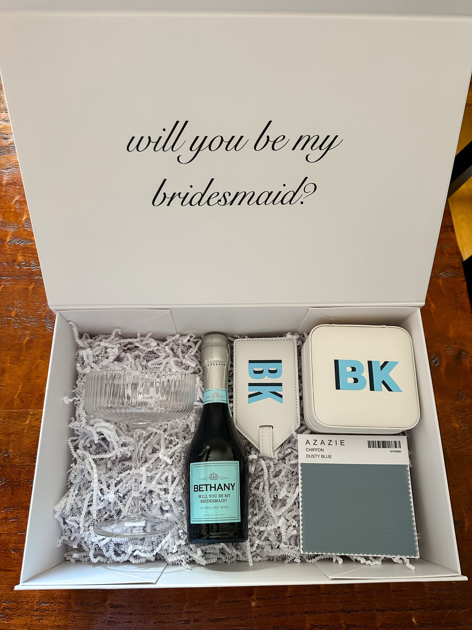 bridesmaid proposal box, eve coupe glass from CB2, luggage tag, jewelry case, personalized champagne bottle

#LTKWedding #LTKCyberWeek