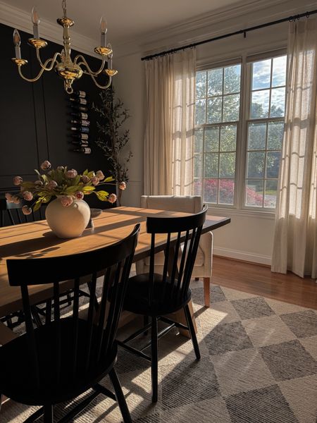 Moody dining room. Black accent wall is black magic by Sherwin Williams. White is Pure White by Sherwin Williams. Vase is from Hobby Lobby

Dining table, checkered rug, dining room decor, dining table, faux spring stems, viral Michael’s peonies, Amazon curtains, accent wall decor

#LTKhome