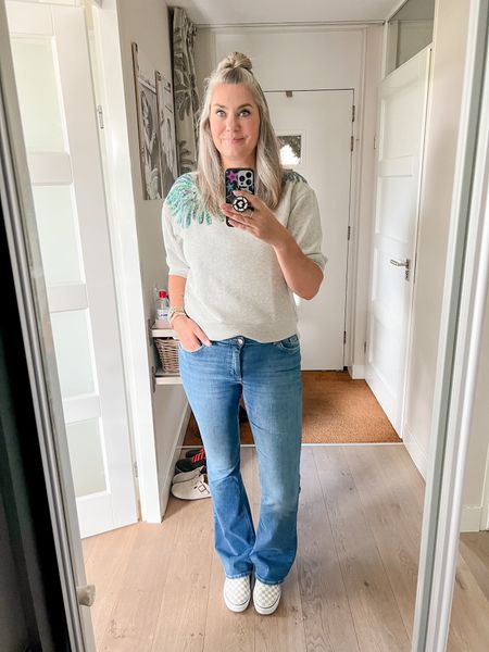 Outfits of the week. A short sleeve grey sweater (really old) paired with blue flared jeans from Only (XL/34”) and checkered Vans slip on sneakers. 



#LTKstyletip #LTKcurves #LTKeurope