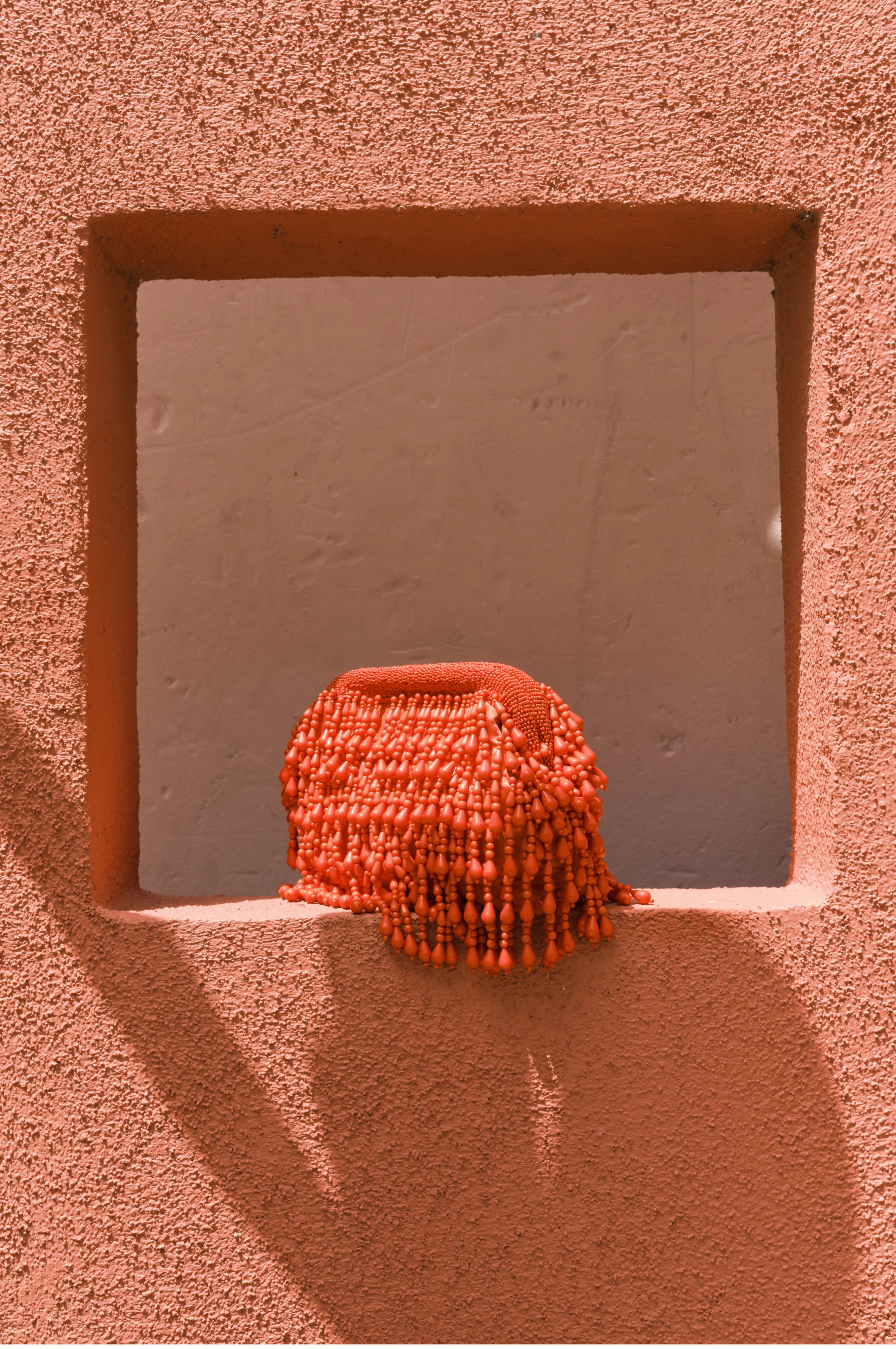 Beaded Drop Clutch In Orange | Simon Miller