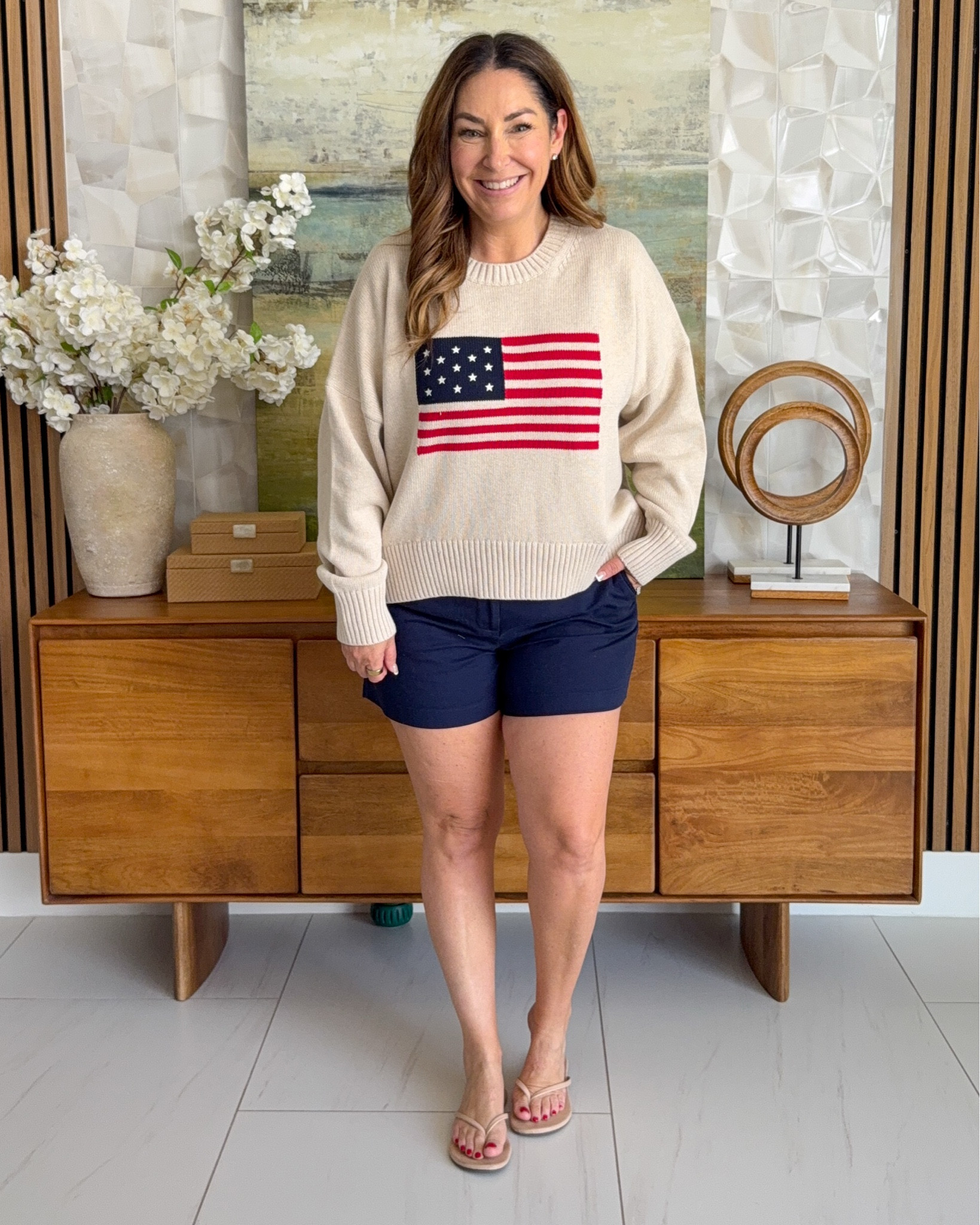 This Quince flag sweater is so good 🇺🇸 Lightweight enough for summer nights and under $60. Paired with classic navy shorts — a perfect patriotic look for Memorial Day, 4th of July, or any summer gathering.

Wearing a large in sweater, size 12 in shorts
5'5 / size 12 for reference

#LTKSeasonal #LTKOver40 #LTKMidsize