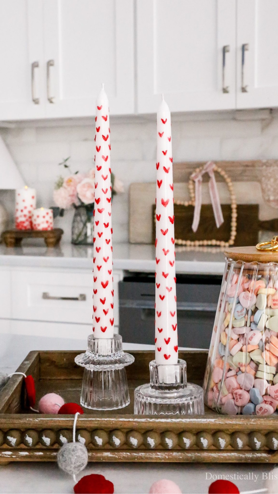 These DIY Painted Heart Candles are so fun and easy to create and would be so fun to make at a girl’s night or Galentine’s Day party.

See details:
https://domesticallyblissful.com/diy-painted-heart-candles/