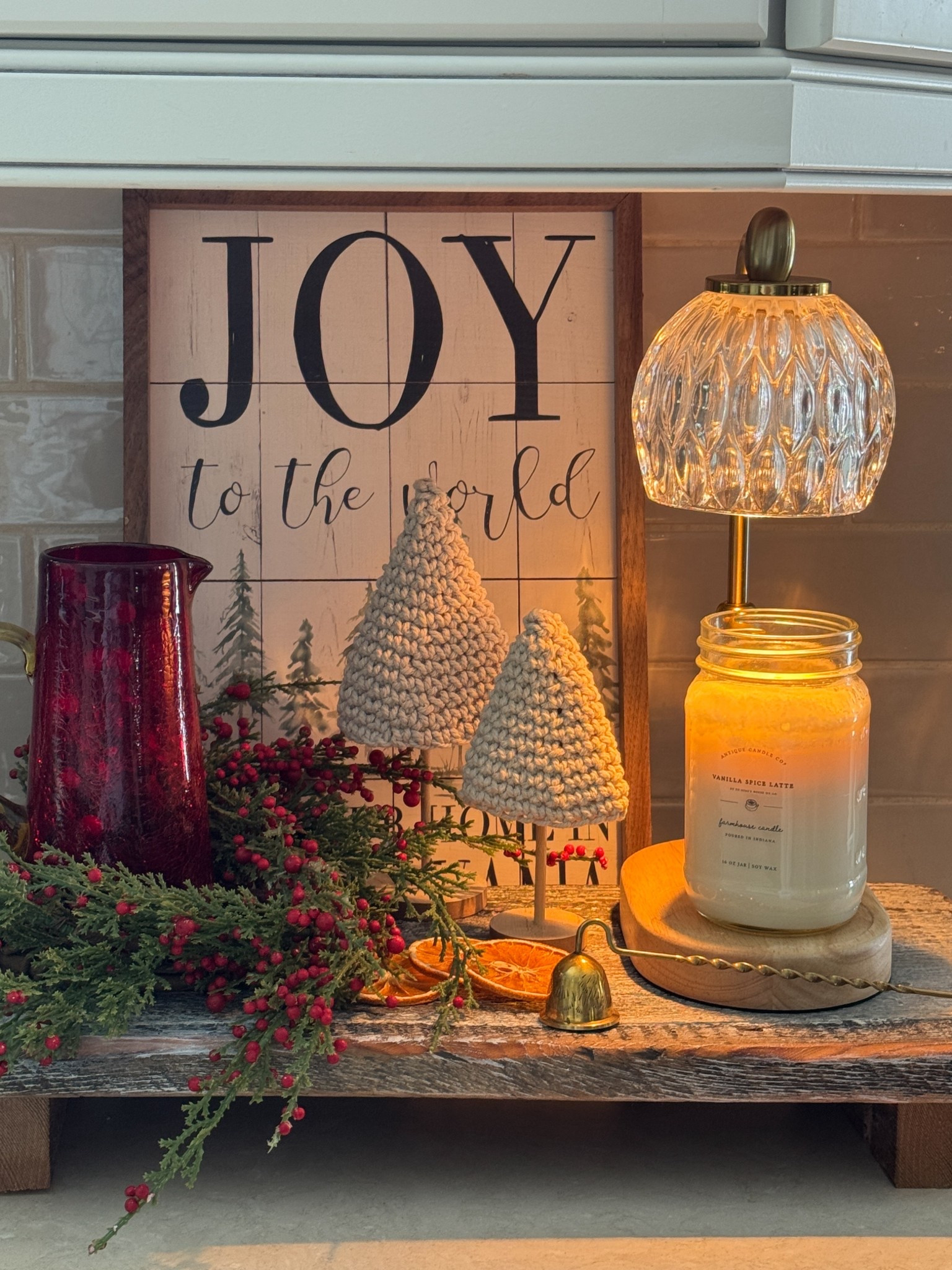 Create this look: Candle warmer and candle, vintage brass candle sniffer, dried orange slices, mini trees, candle ring, wood riser. 

#LTKHome #LTKHoliday #LTKGiftGuide