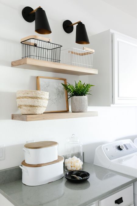 Simple open shelf decor for a laundry room. 
Laundry room decor 
Baskets
Pots
Storage 
White oak shelves
Sconces 

#LTKhome #LTKsalealert #LTKstyletip
