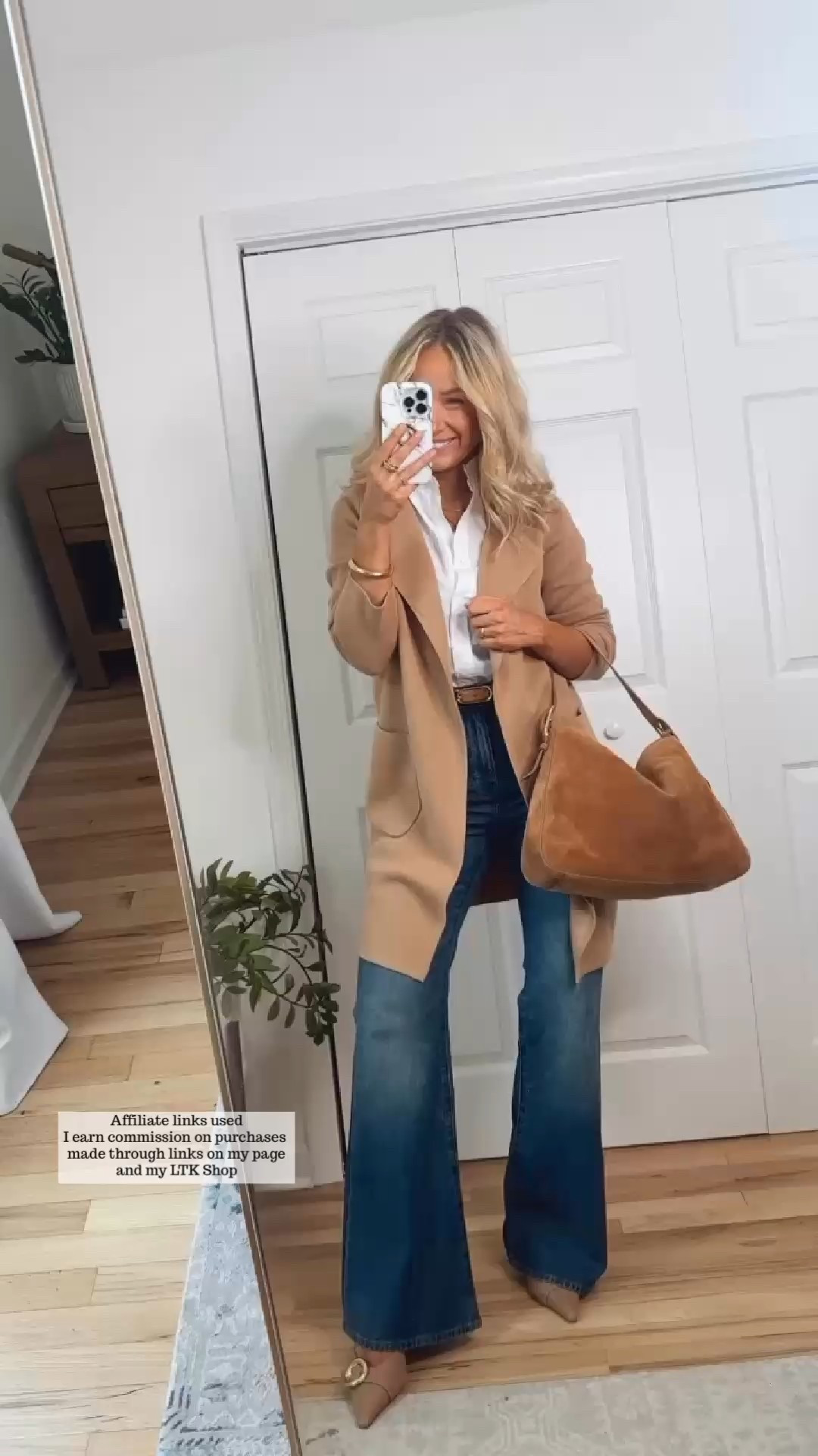 Casual fall outfit with flare leg jeans

Camel duster cardigan, ruffle collar white button up shirt, tan suede bag