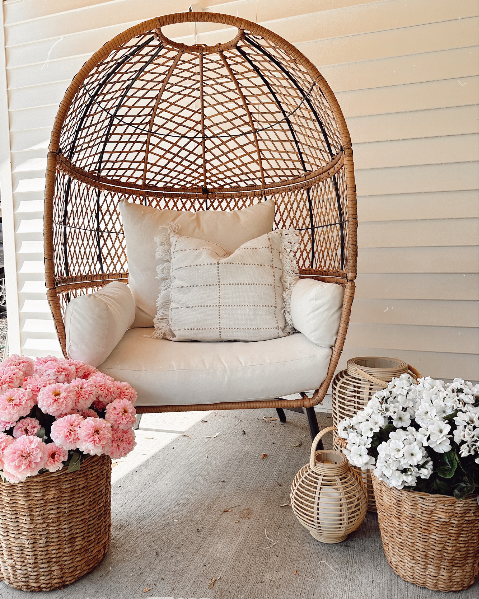 This egg chair is my favorite spot to read on the front porch 🤎 this year we decided on faux flowers to keep it low maintenance and we're so happy we did! They're on sale now 🌸



Seagrass woven basket, Walmart outdoor furniture, wicker, lanterns, front porch decor, boho patio decor, pink decor, grandin road, afloral, Home Depot, storage basket, farmhouse, wall decor, 4th of July, nursery, summer dress, outdoor lighting, skin care, summer garden, outdoor planters, toddler toys, country concert, travel essentials, target decor, date night, summer trends, rattan furniture, gold accents, bedding

#LTKhome #LTKsalealert #LTKSeasonal