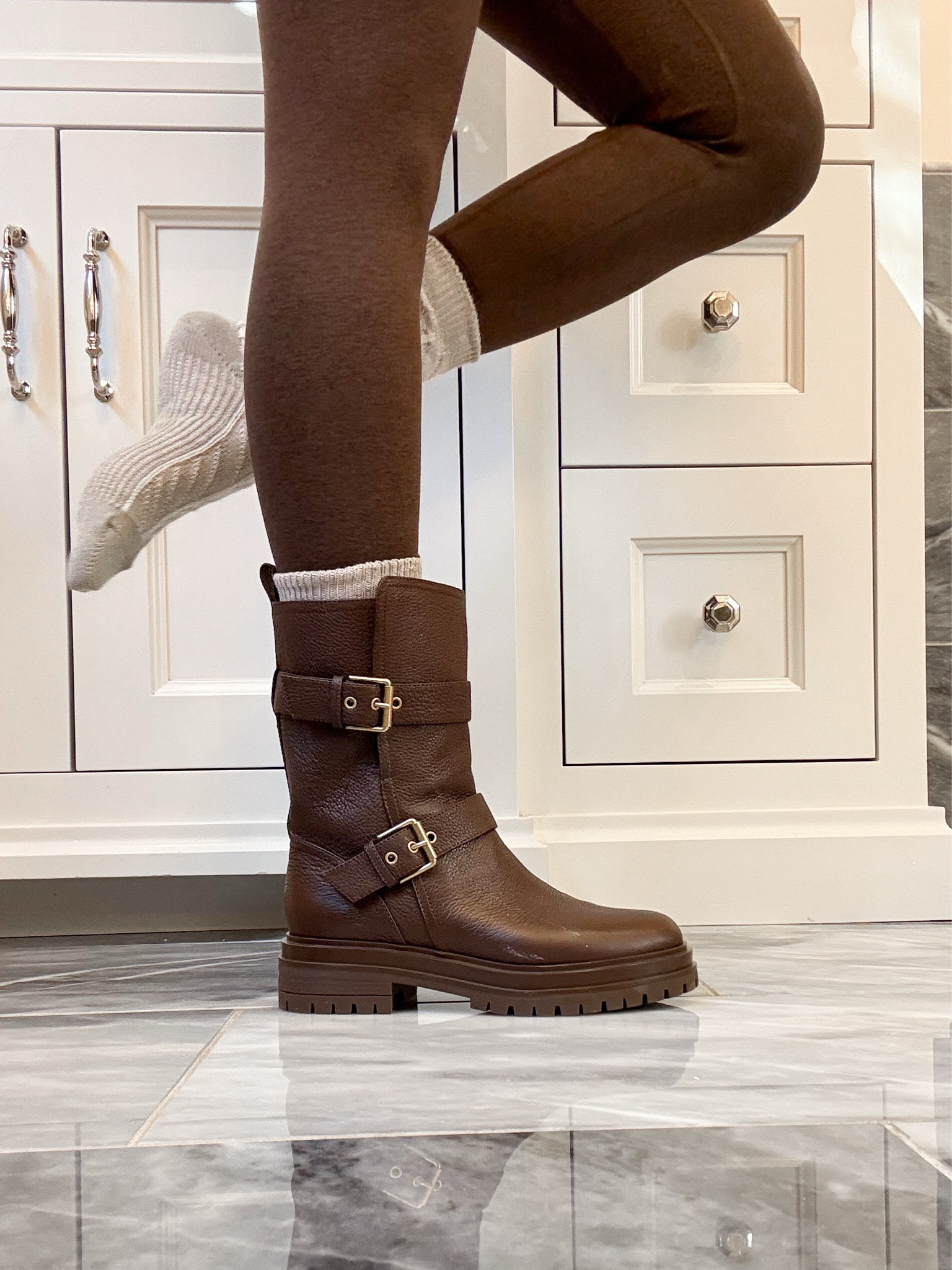 Biker boots with tread / good for wearing on ice or snow. Love the gold buckle boot look - they are on sale now, too! 

#LTKSeasonal #LTKSaleAlert #LTKShoeCrush