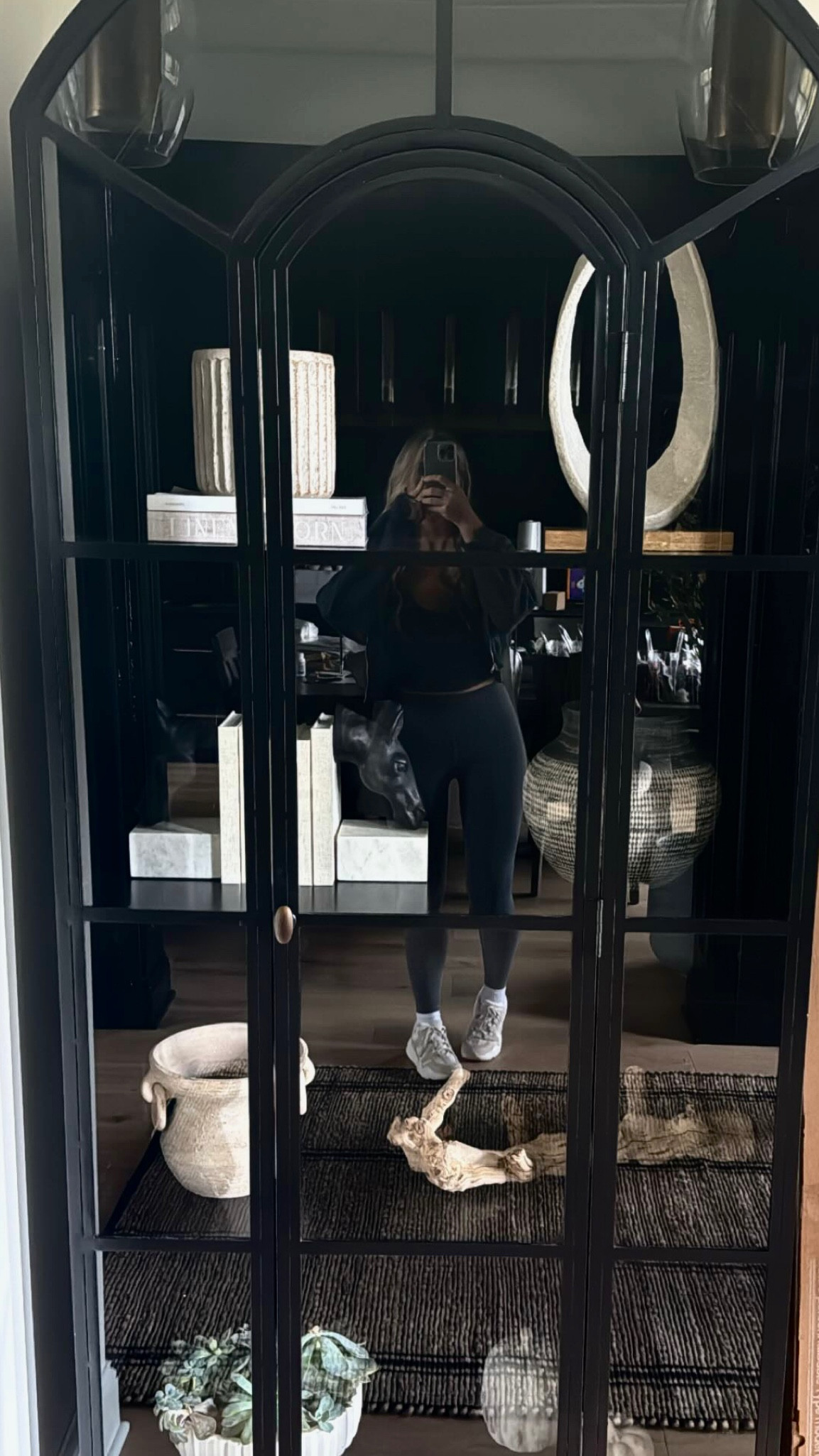 Shelf styling. Shelf decor. Arched cabinet. Modern shelving decor. McGee & Co. Pottery Barn. Black glass cabinetts

#LTKhome