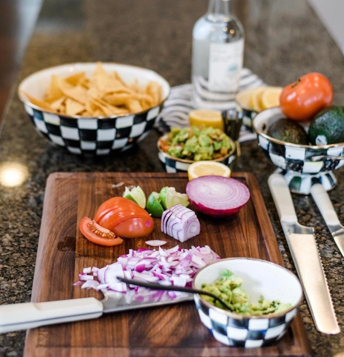 I pulled out these MacKenzie Childs pieces while making guacamole, and they made a simple snack spread feel much more put together. The black and white Courtly Check pattern mixes easily with everyday dishes, while the bowls are practical for chips, toppings, and prep ingredients without sacrificing personality.

MacKenzie Childs, Courtly Check, kitchen accessories, serving bowls, guacamole bar, entertaining essentials, black and white kitchen decor, hostess gift, tabletop decor, TheMomInStyle

#LTKHome #LTKSeasonal #LTKdayinmylife