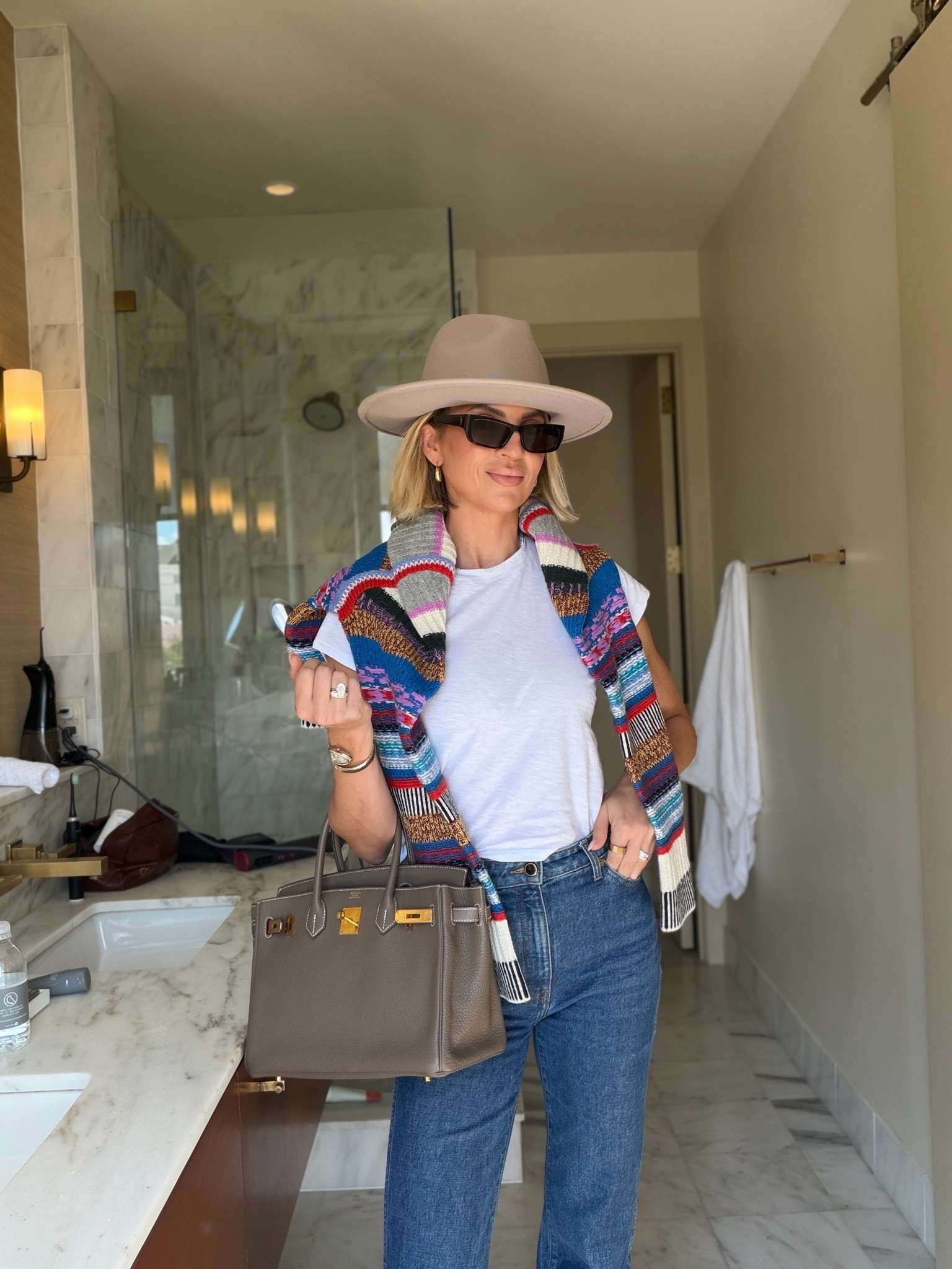 I didn’t realize how much I was going to like this pop of color from the sweater! Anyway, wearing a medium in the sweater. A small in the T-shirt and jeans run TTS. ￼

#LTKootd #LTKTravel #LTKOver40