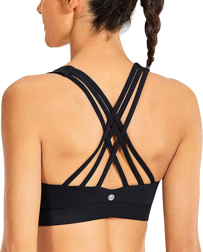 CRZ YOGA Women's Strappy Sports Bra Full Coverage Padded Full Size Criss Cross Workout Yoga Bra T... | Amazon (US)