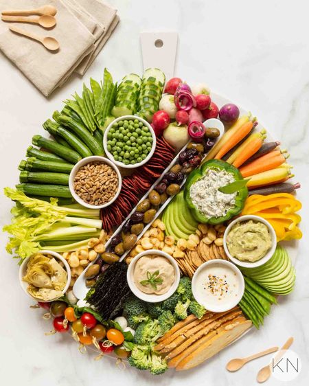 This fresh crudités board features mini and rainbow versions of ALL the veggies. It’s perfect for any warm weather celebration including bridal showers, pool parties and dining al fresco. charcuterie board cheese board party food entertaining idea veggie board healthy food fresh veggies party platter

#LTKhome #LTKunder50 #LTKstyletip