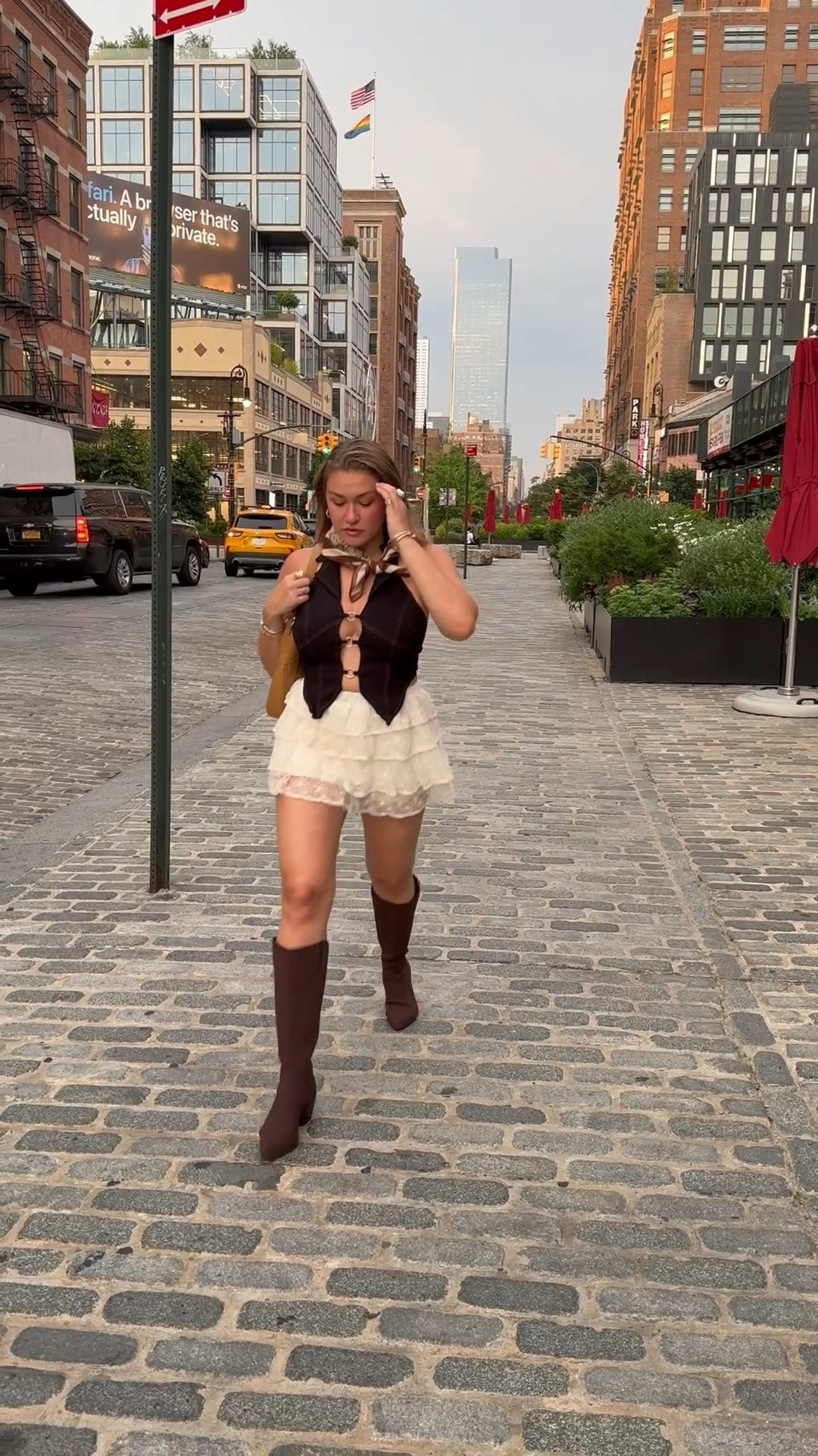 Country concert inspired outfit with a white ruffle mini skirt; tall cowboy boots, sexy denim top, shoulder bag & cute neck scarf! 

#LTKSeasonal #LTKMidsize #LTKStyleTip