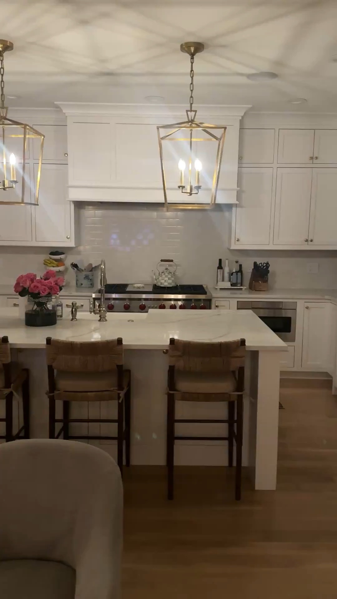 Soft lighting, layered neutrals, and pieces that feel collected over time—not trend-led, just timeless and functional. This is the heart of our home, especially at dusk when everything feels a little quieter.

Sharing sources for the pendants, counter stools, runner, and a few favorite styling details that pull it all together.

#LTKHome